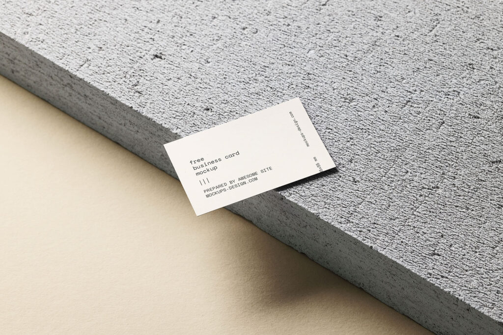 Free business card on a concrete block mockup