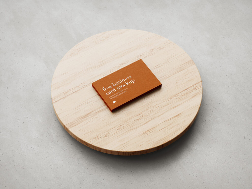 Business cards on wooden plate